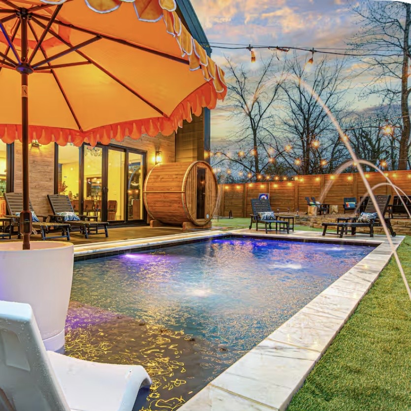 Heated pool and barrel sauna at Fall Send house