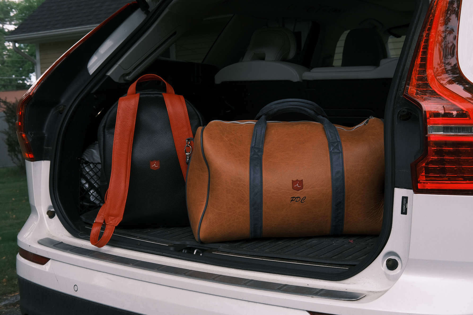 iliac leather duffel bag and backpack
