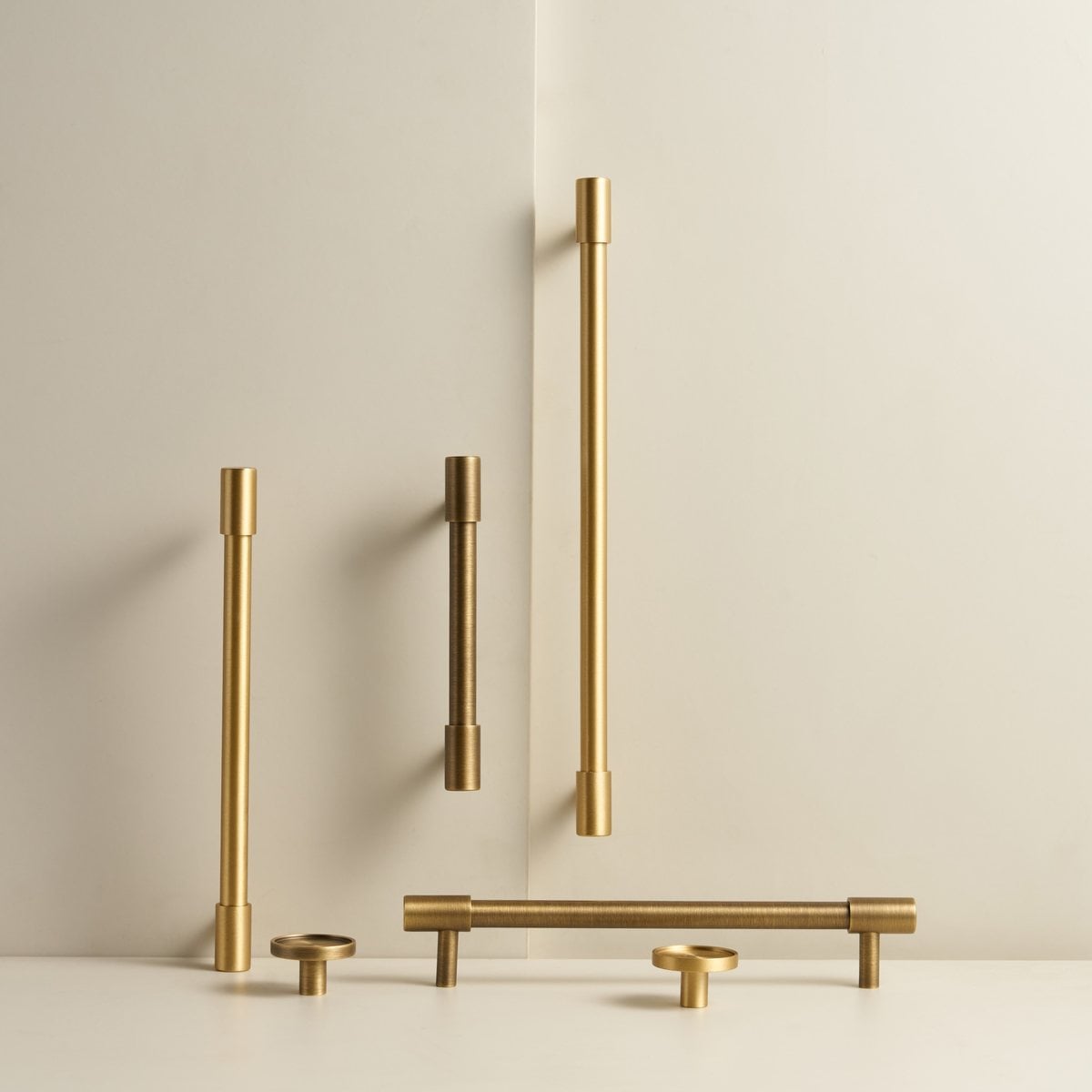 RAND solid brass bar handles in three lengths, in satin and antique brass, with two matching knobs